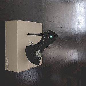 Black suede heels with gold studs